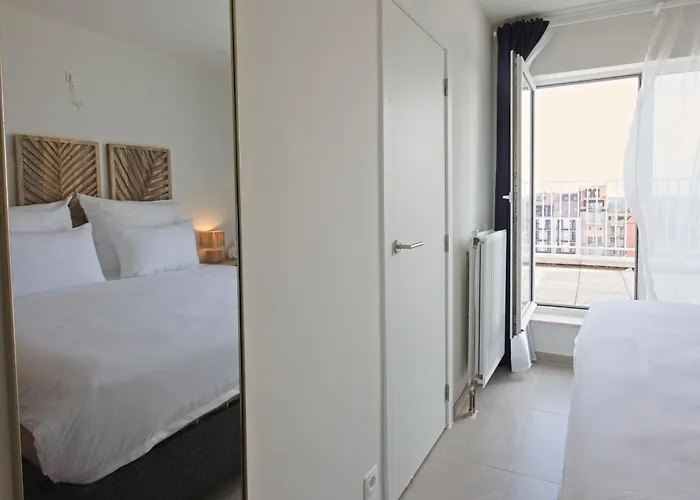 Апартаменты The Happy View - Penthouse Met 2 Terrassen Op De Zeedijk Кнокке-Хейст